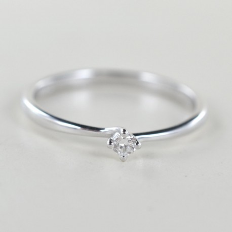 Small solitaire ring with Valentine setting diamond 0.06 carat