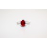 Ring in silver 925 with zircons embedded in white and the center stone color ruby red