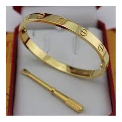 Bracelet homme rigide modèle Cartier avec ouverture à la taille en or jaune BR916G